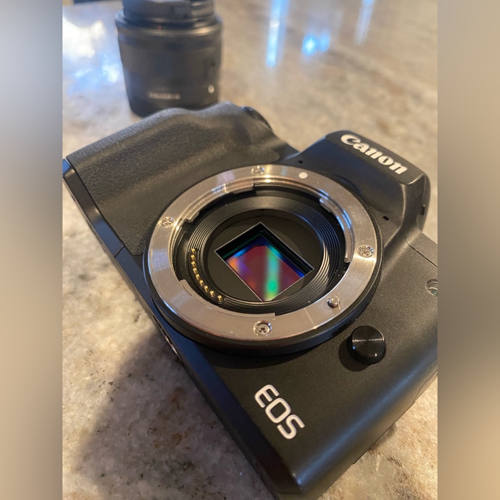 Canon eos m50 mark ii with kit lens. 55-250 ml lens. And adapter for 55-250 lens